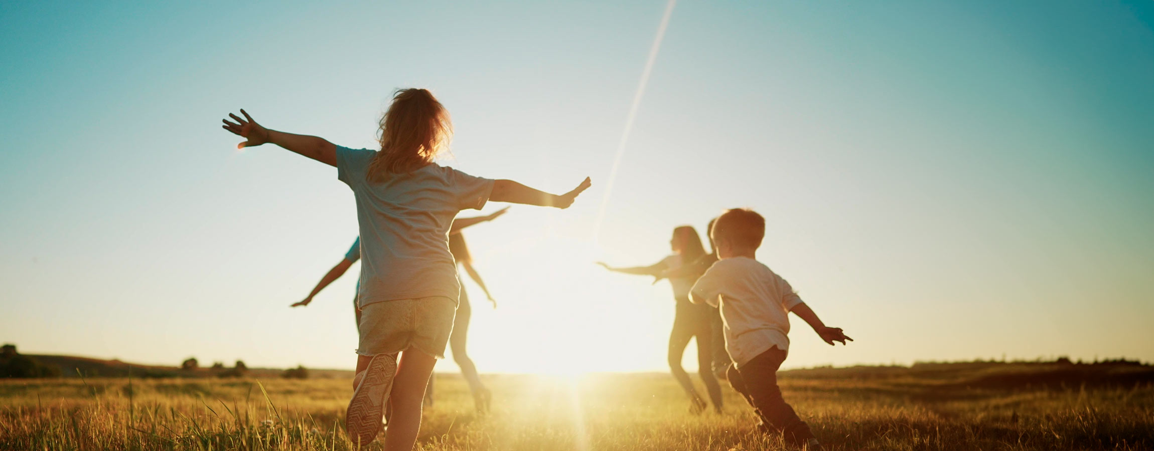 field with children running