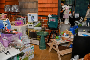 Array of donated items on display for the Live Auction at the 2026 EHFAR Fundraiser, For the Love of Perry Kids