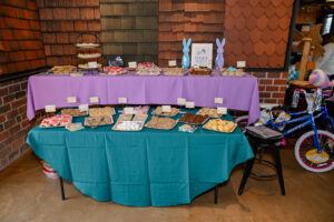 Array of donated homemade cookies displayed on the Cooke Table at the 2026 EHFAR Fundraiser, For the Love of Perry Kids