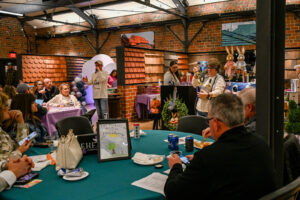 Auctioneer Jeremy Seals taking bids in the Live Auction at the 2026 EHFAR For the Love of Kids Fundraiser.