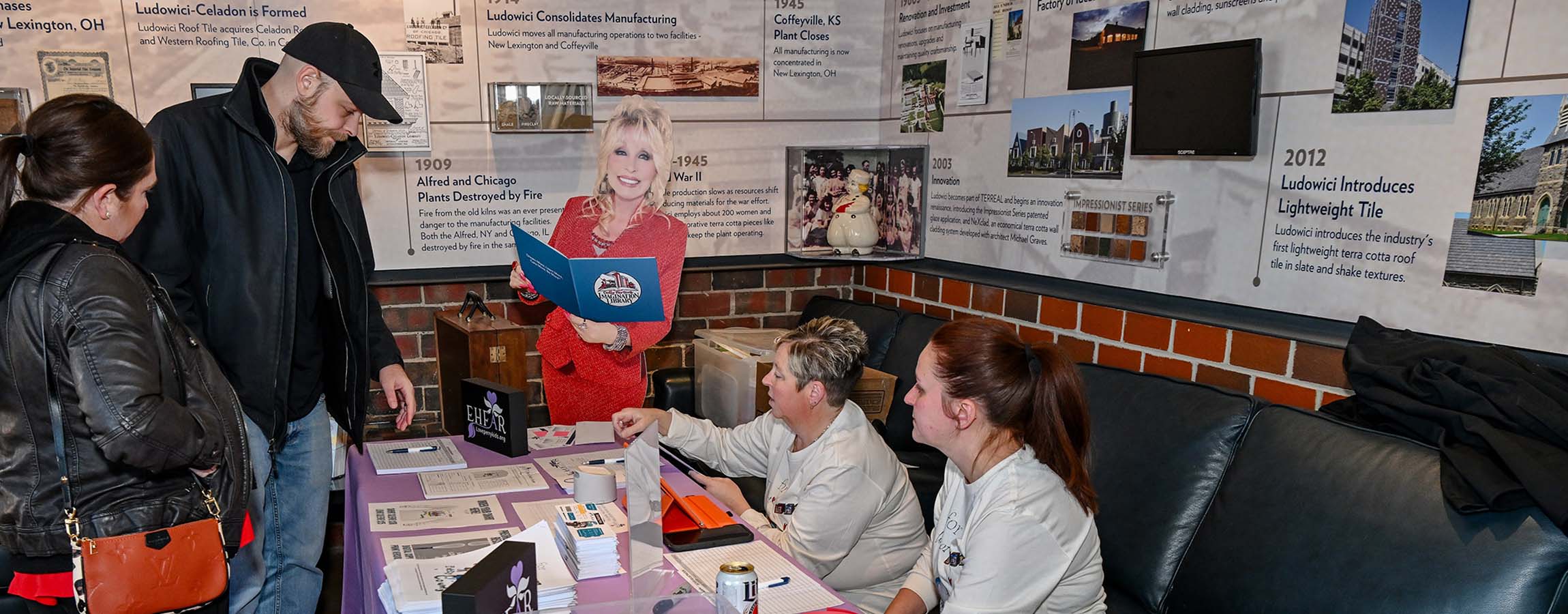 Guests registering at the welcome table at the For Love of Perry Kids 2026 fundraiser